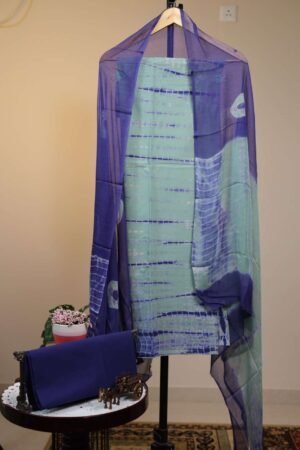 Cotton Salwar with Chiffon Dupatta - Mint Green base featuring horizontal tie-dye (Shibori-style) stripe patterns in dark Indigo Blue.
